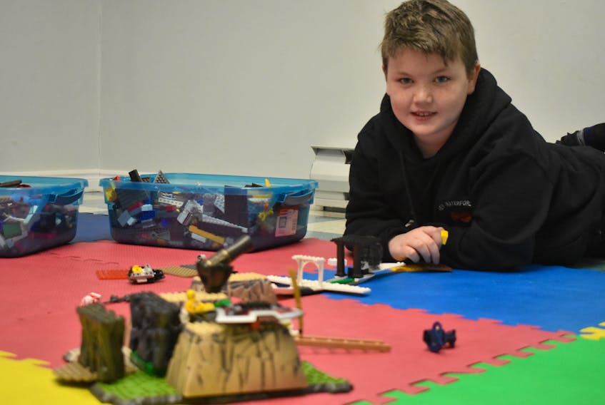 Cale Baker, nine, made a cannon battle field and war ship during Lego Club at New Waterford Library last week. He said his favourite part of Lego Club is using his designs to have battles with his friend Karson McVarish.