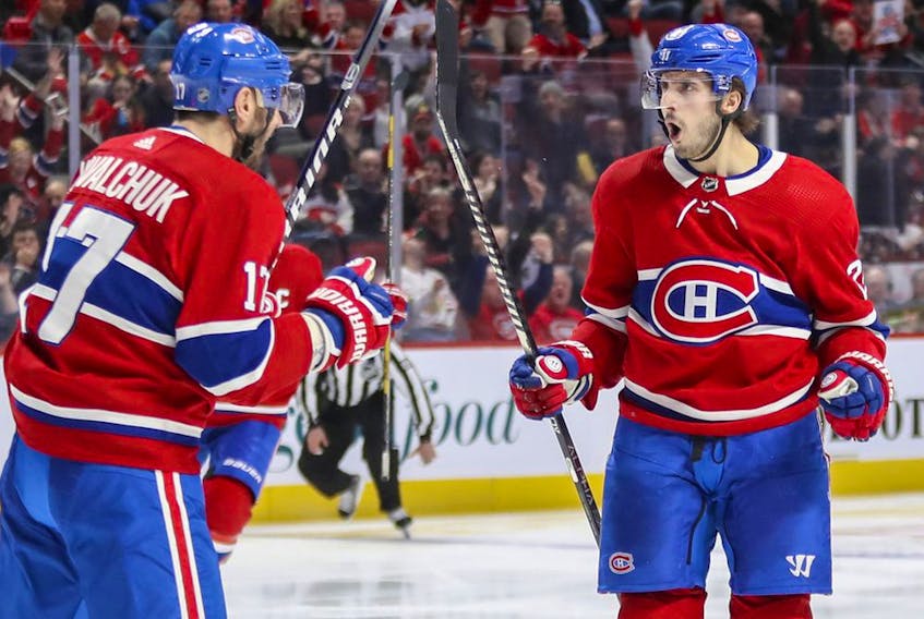 Montreal Canadiens' Phillip Danault celebrates his goal with Ilya Kovalchuk against the Chicago Blackhawks in Montreal on Jan. 15, 2020.