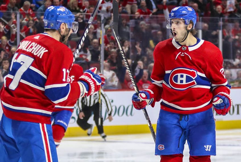  Montreal Canadiens’ Phillip Danault celebrates his goal with Ilya Kovalchuk during second period against the Chicago Blackhawks in Montreal on Jan. 15, 2020.
