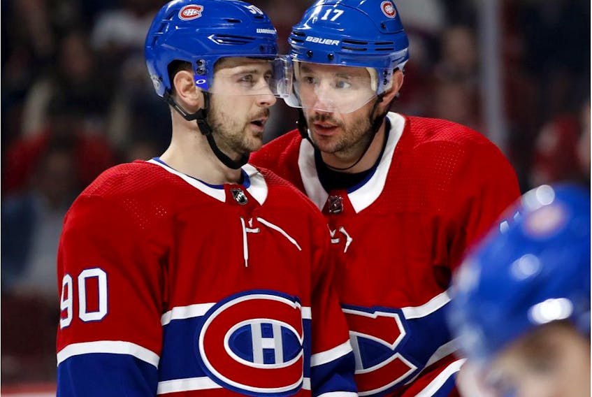  Montreal Canadiens’ Ilya Kovalchuk and Tomas Tatar confer before a faceoff during game against the Winnipeg Jets in Montreal on Jan. 6, 2020.