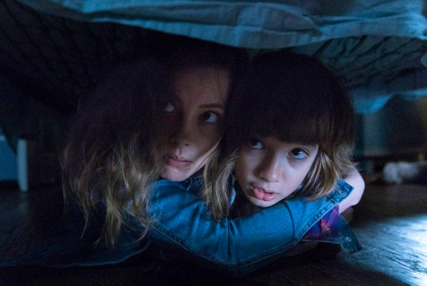 Under the bed? Good a place as any, I guess. Gillian Jacobs and Azhy Robertson in Come Play.