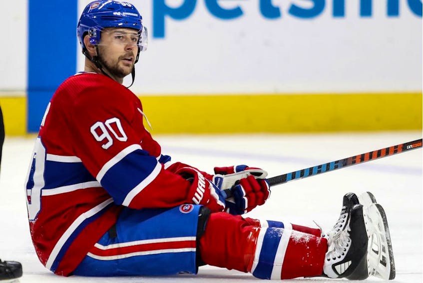 Canadiens forward Tomas Tatar sits on the ice after being knocked down during NHL game against the Anaheim Ducks at the Bell Centre in Montreal on Feb. 6, 2020. 