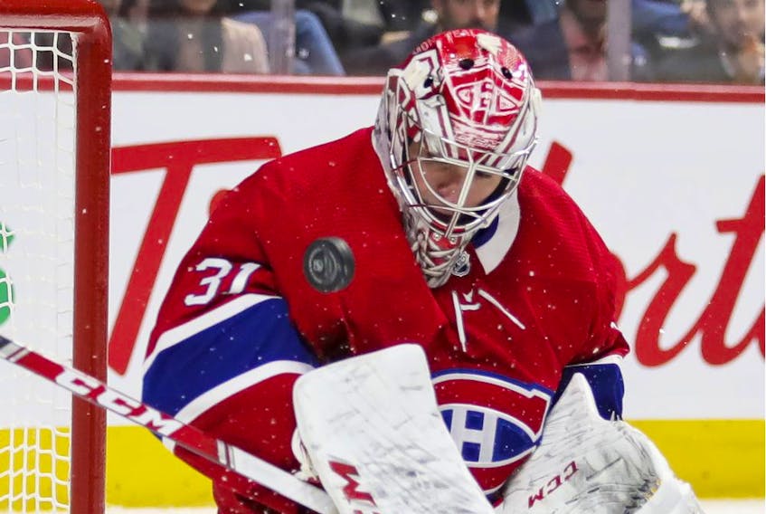  Canadiens’ Carey Price makes a save against the Arizona Coyotes in Montreal on Monday, Feb. 10, 2020.