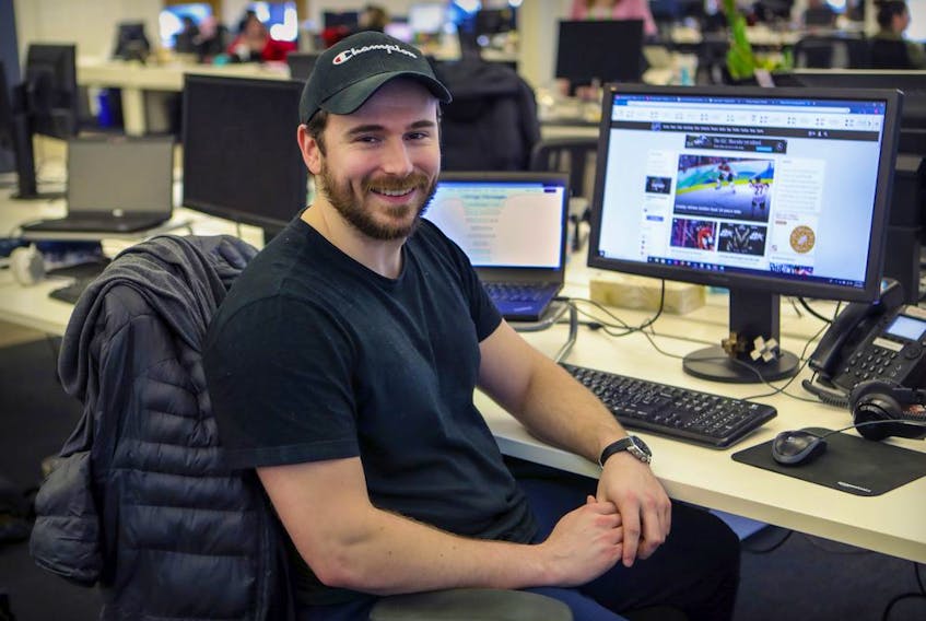  Antoine Marchand at his desk at SweetIQ, a digital marketing company, in Montreal on Friday, Feb. 28, 2020. Marchand is the Canadiens’ emergency backup goaltender.