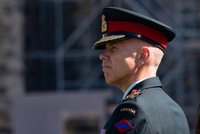 Lieutenant-General Wayne Eyre listens to speakers during a change of command parade for the Canadian Army on Parliament Hill Tuesday, August 20, 2019 in Ottawa. 