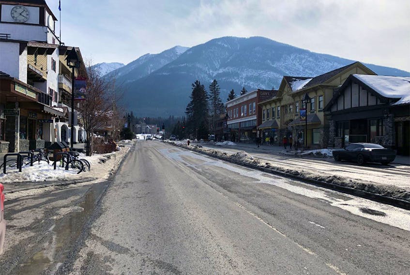 No traffic and very few visitors walk the street of Banff on March 21. 
