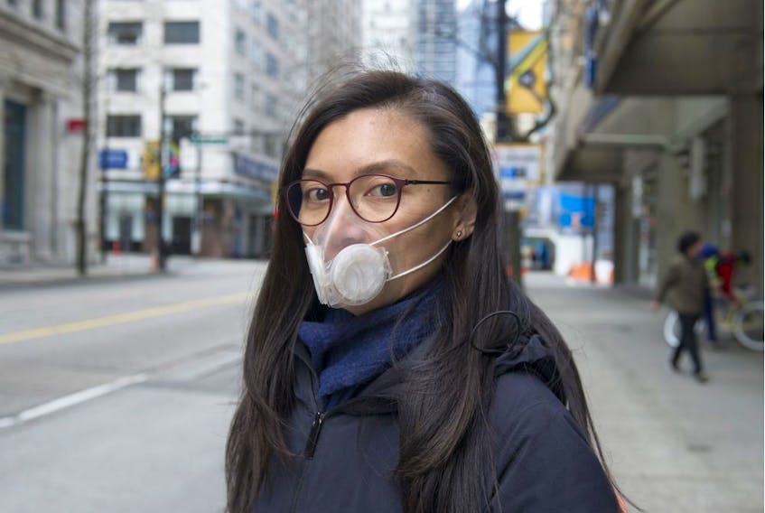 Irene Pang, a professor at SFU's Harbour Centre campus, says health care professionals should have priority in getting masks, but that everyone should wear them to help fend off COVID-19.
