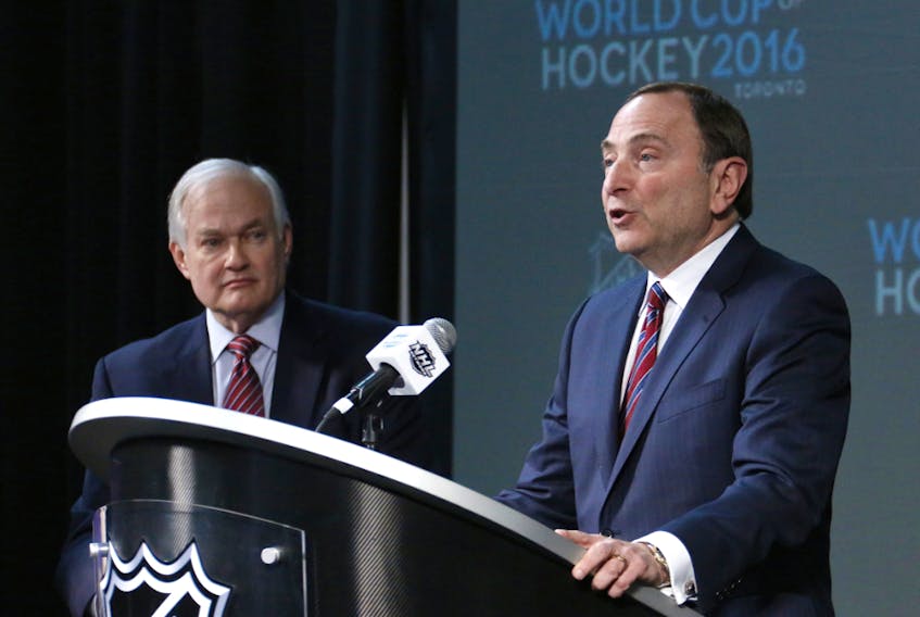 FILE -  In this file photo from Jan. 24, 2015, NHL commissioner Gary Bettman, right, and NHL Players Association executive director Donald Fehr announce the return of the World Cup of Hockey in 2016 in Toronto.