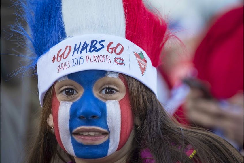 Canadiens fan Maria Mollineda wears bleu-blanc-rouge at Fan Jam before playoff game against the Ottawa Senators at the Bell Centre in Montreal on April 15, 2015.