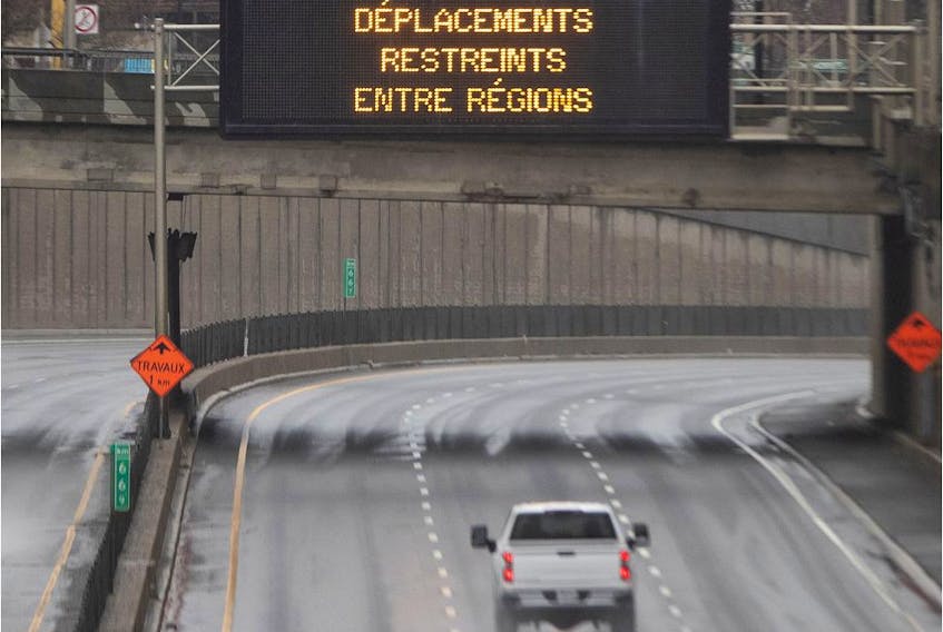 Light traffic is seen on Decarie Expressway in Montreal, on Tuesday, April 21, 2020. 