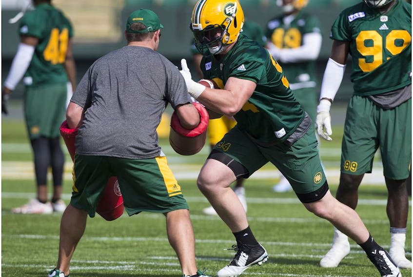 Jake Ceresna (94) takes part in the second day of the Edmonton Eskimos' training camp at Commonwealth Stadium, in Edmonton Monday May 21, 2018. 