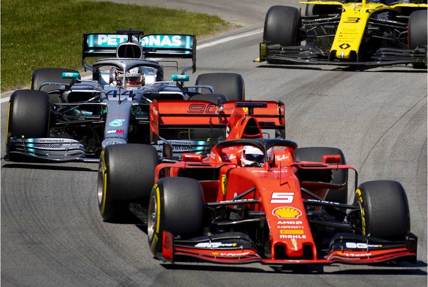 Ferrari's Sebastian Vettel leads the pack into the first turn during the Canadian Grand Prix at Circuit Gilles-Villeneuve on June 9, 2019.