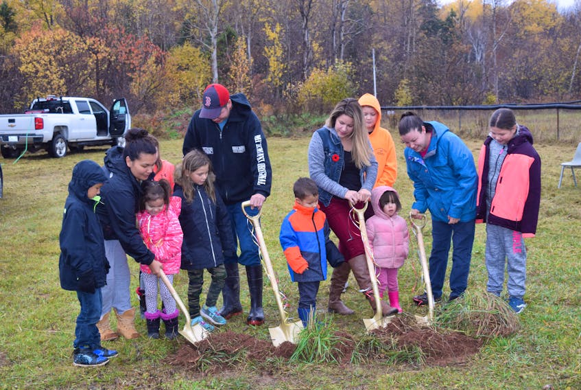 Former students of the Pictou Landing First Nation School – and their children, presently attending the school – gathered on Thursday morning to break ground on a new school, which is expected to open next year. Hilary Nicholas with her children Elias Gogoo; Uriah Sannipas; Craig Francis with his children Bailie Francis and Taylin Francis; Cynthia Denny with her children Lucas Denny; Dryson Copage and Deidre Copage; and Veronica Mills with her daughter Sophie Mills -Deal.