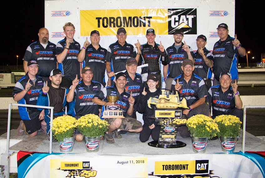 The King Racing crew being the #13 driven by Cassius Clark wins the Toromont Cat 250 at Scotia Speedworld Saturday. This is Clark's fourth win at the CAT 250.  King Racing is based out of Pictou, NS and is owned by Rollie and Judy MacDonald.  
John Musick Photo