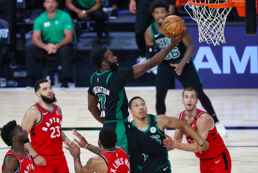 Boston Celtics guard Jaylen Brown makes a layup against the Toronto Raptors during Game 5 on Monday.