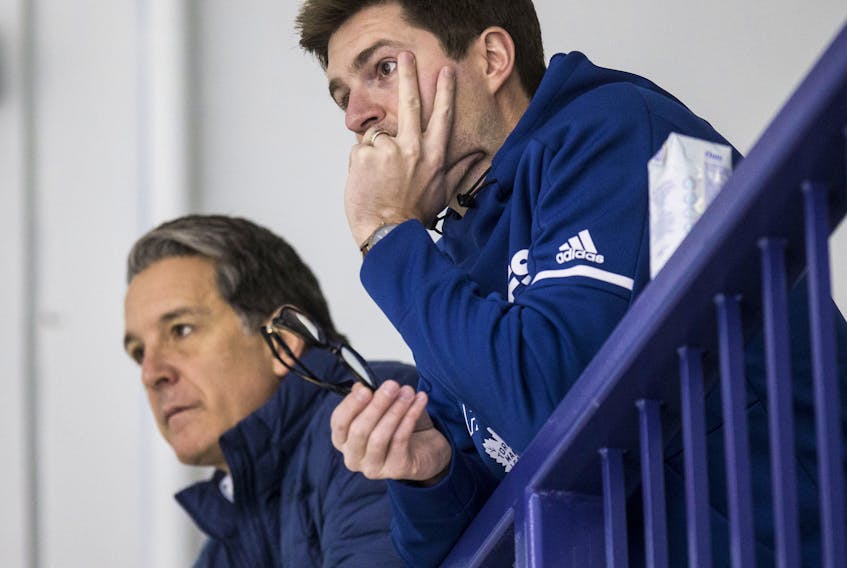 Just like you, Kyle Dubas Leafs GM (R)  and Brendan Shanahan are at home waiting to see when hockey will be back on.  Craig Robertson/Toronto Sun/Postmedia Network