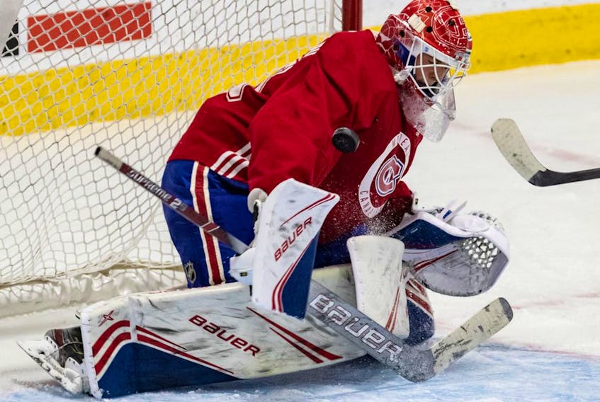 Goaltender Cayden Primeau stops a shot during the Montreal Canadiens' rookie camp at the Bell Sports Complexe in Brossard on Sept. 6, 2019.