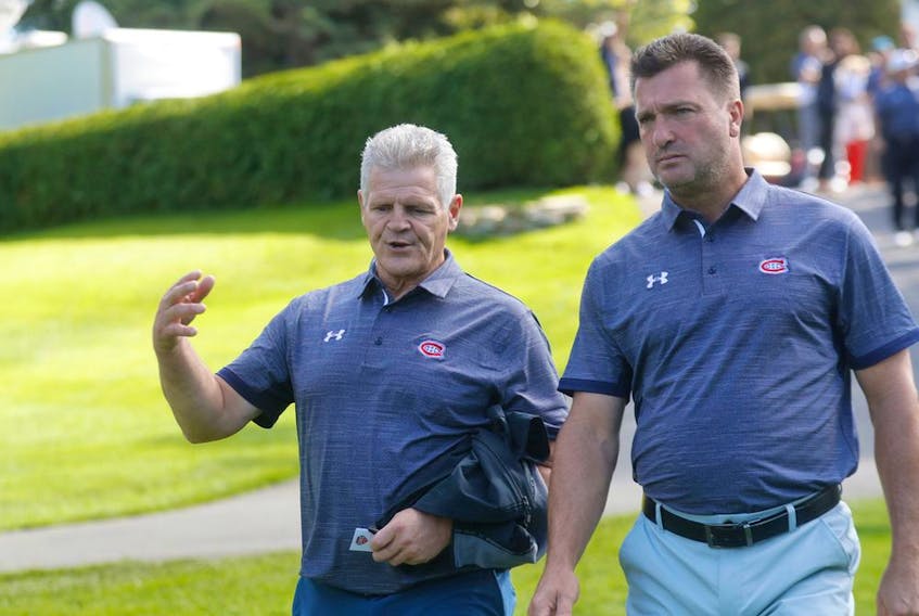  Former Canadiens Chris Nilan, left, and Stéphane Richer were on hand at the Canadiens’ annual golf tournament on Sept. 9. Richer says Habs brass does its best to keep alumni away from current players.