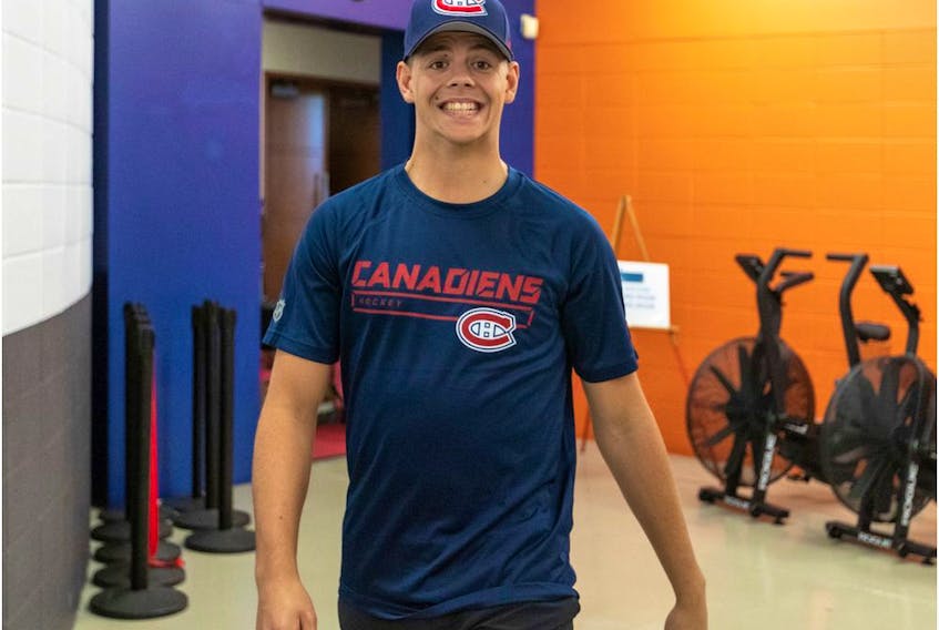 Jesperi Kotkaniemi flashes big smile on the opening day of Canadiens training camp at the Bell Sports Complex in Brossard on Sept. 12, 2019.