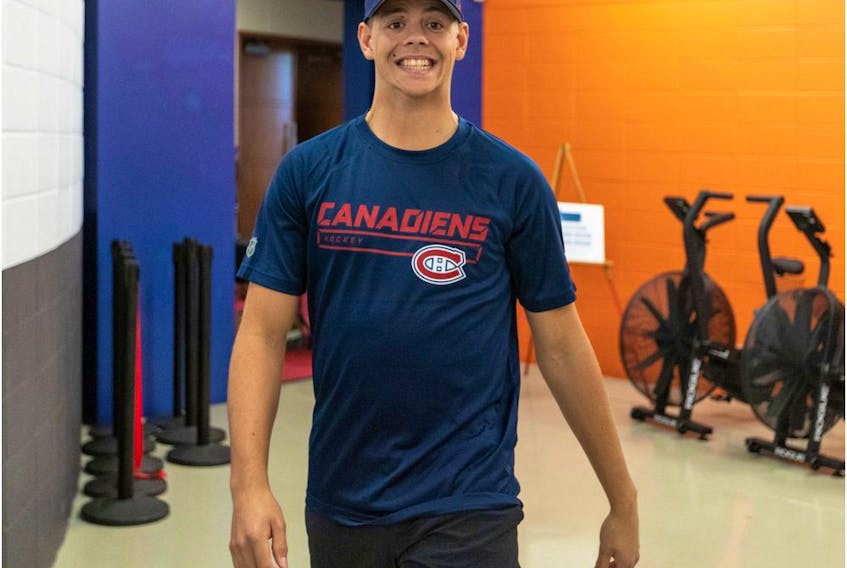 Jesperi Kotkaniemi flashes big smile on the opening day of Canadiens training camp at the Bell Sports Complex in Brossard on Sept. 12, 2019.
