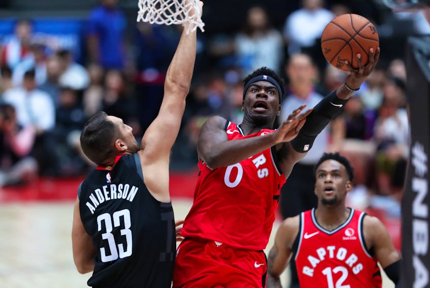 Raptors rookie Terence Davis drives to the basket against Houston Rockets’ Ryan Anderson during Tuesday's game. (GETTY IMAGES)