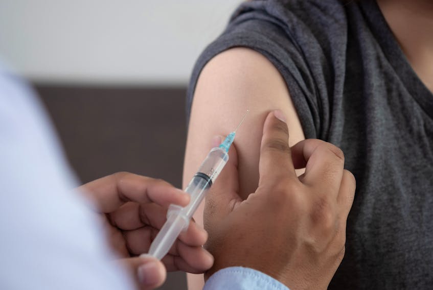 Stock photo of someone getting vaccinated.