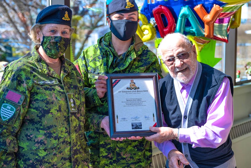 Lieutenant Colonel Irene d’Entremont and Captain Sacha Demers with Second World War veteran Alcide J. LeBlanc during a scroll and coin presentation on his 101st birthday. PHOTO BY MCpl SAM MARTELL 