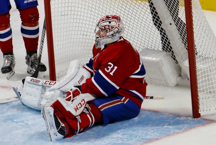  Canadiens goalie Carey Price takes a breather after making a save against the Lightning Tuesday night at the Bell Centre.
