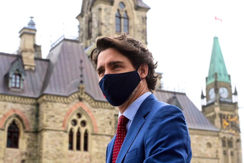 Prime Minister Justin Trudeau makes his way to a press conference in Ottawa on Oct. 16.