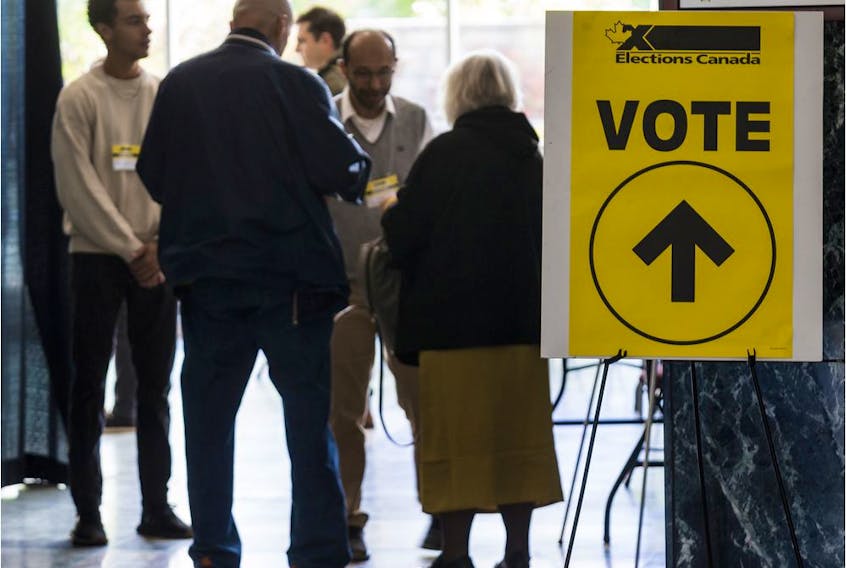 Residents enter the advance polling station at Ottawa City hall on Oct. 11, 2019. 