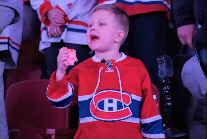 Boyd Petry cheers on his father, Jeff, during a Canadiens game against the Florida Panthers at the Bell Centre on Feb. 1, 2020.