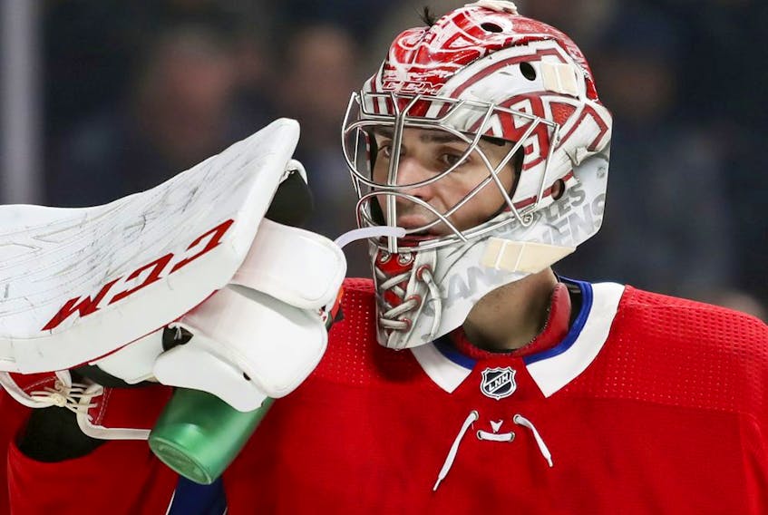 Canadiens goalie Carey Price takes a water break during second period of NHL game against the San Jose Sharks at the Bell Centre in Montreal on Oct. 24, 2019. 