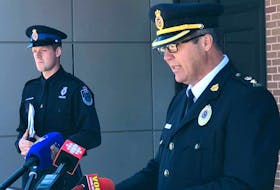 Superintendent Tom Warren (right) and Constable James Cadigan of the RNC at this morning's news conference. — Tara Bradbury
