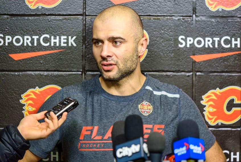 Calgary Flames Captain Mark Giordano provides an update Friday on TJ Brodie, who experienced an episode on-ice at practice yesterday. Photo by Azin Ghaffari/Postmedia.