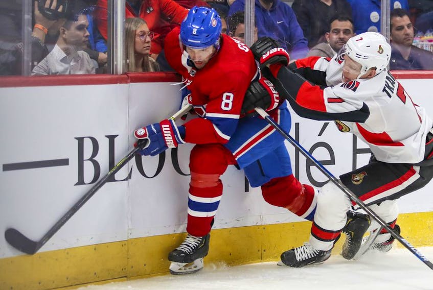  Montreal Canadiens’ Ben Chiarot is checked by Ottawa Senators’ Brady Tkachuk during second period in Montreal on Nov. 20, 2019.