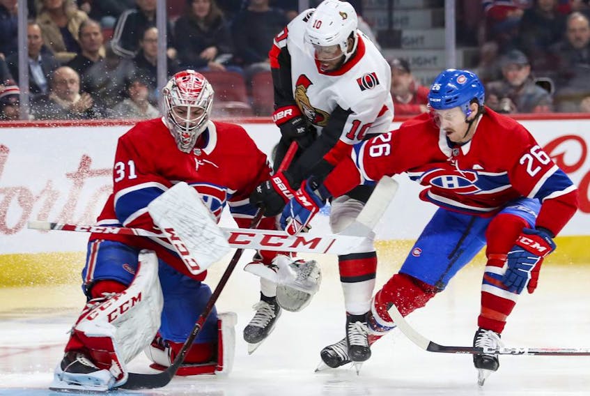 Montreal Canadiens goalkeeper Carey Price uses his skate to stop shot by Antony Duclair of the Ottawa Senators, with help from defenceman Jeff Petry during second period of National Hockey League game in Montreal Wednesday November 20, 2019. 