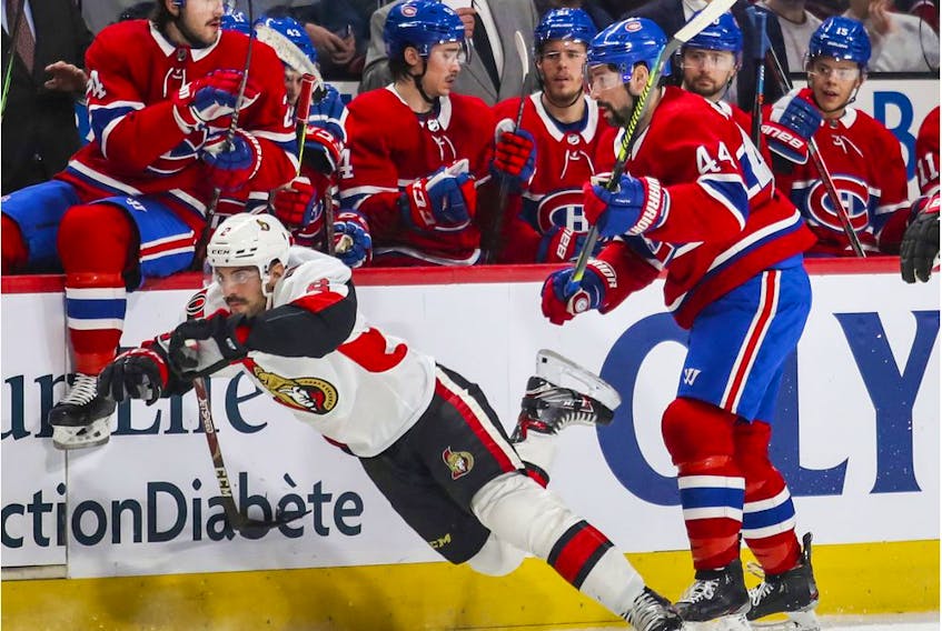  Montreal Canadiens’ Jesperi Kotkaniemi looks to pass during third period against the Ottawa Senators in Montreal on Nov. 20, 2019.