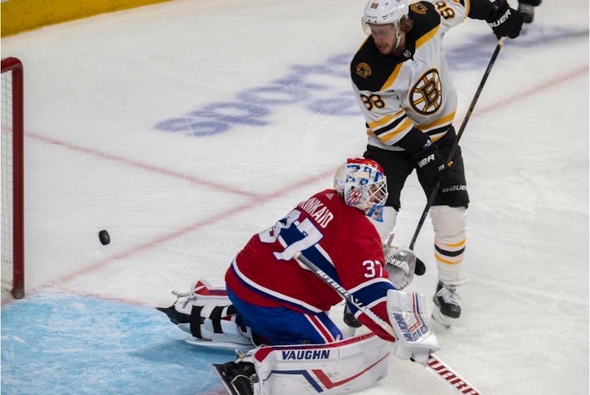  Boston Bruins right-wing David Pastrnak scores on Canadiens’ Keith Kinkaid during second period at the Bell Centre in Montreal on Nov. 26, 2019.