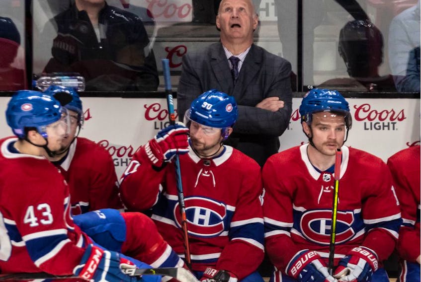 Canadiens head coach Claude Julien looks up at the scoreboard in the dying seconds of an 8-1 loss to the Boston Bruins  at the Bell Centre in Montreal on Tuesday, Nov.  26, 2019.   