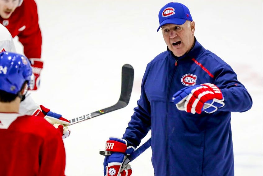 Montreal Canadiens head coach Claude Julien, right, speaks with associate coach Kirk Muller practice at the Bell Sports Complex in Brossard on Wednesday Nov. 27, 2019. 
