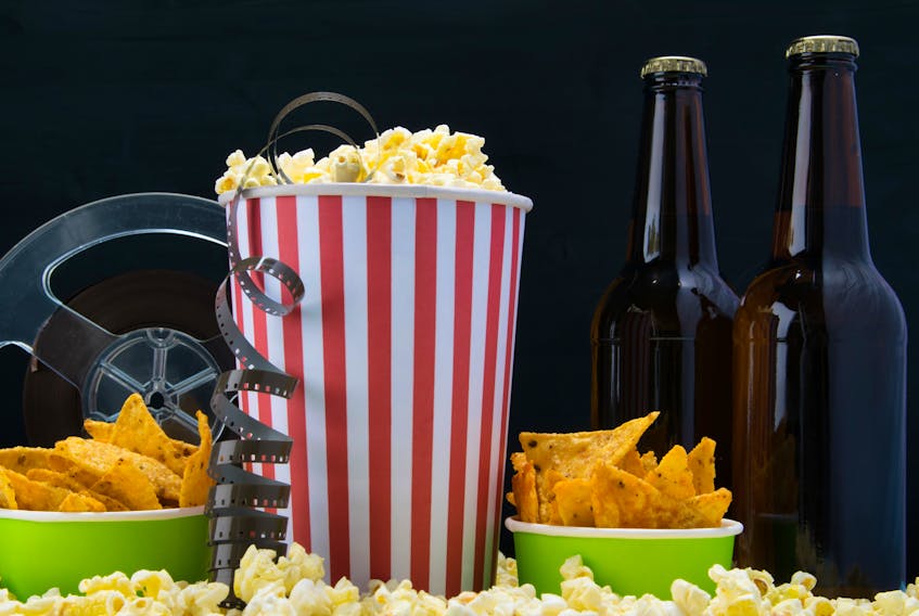 Movie snacks with beer. Stock.