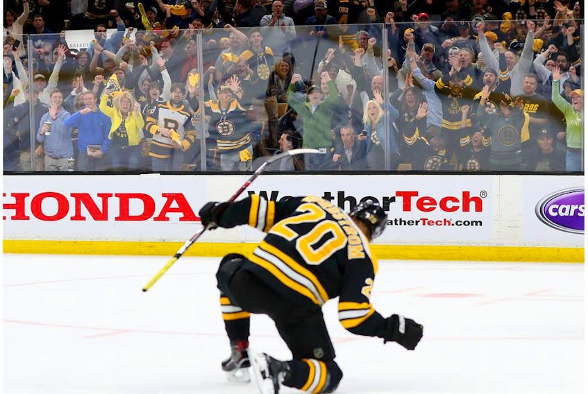 BOSTON, MASSACHUSETTS - APRIL 23: Fans celebrate in front of Joakim Nordstrom #20 of the Boston Bruins after he scored a goal against the Toronto Maple Leafs during the first period of Game Seven of the Eastern Conference First Round during the 2019 NHL Stanley Cup Playoffs at TD Garden on April 23, 2019 in Boston, Massachusetts.