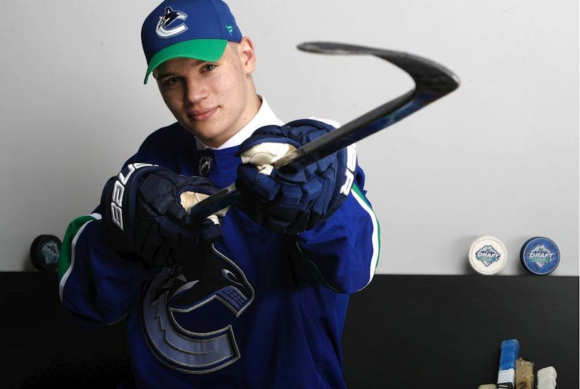 Vasili Podkolzin poses for a portrait after being selected 10th overall by the Vancouver Canucks during the first round of the 2019 NHL Draft at Rogers Arena on June 21, 2019 in Vancouver, Canada.