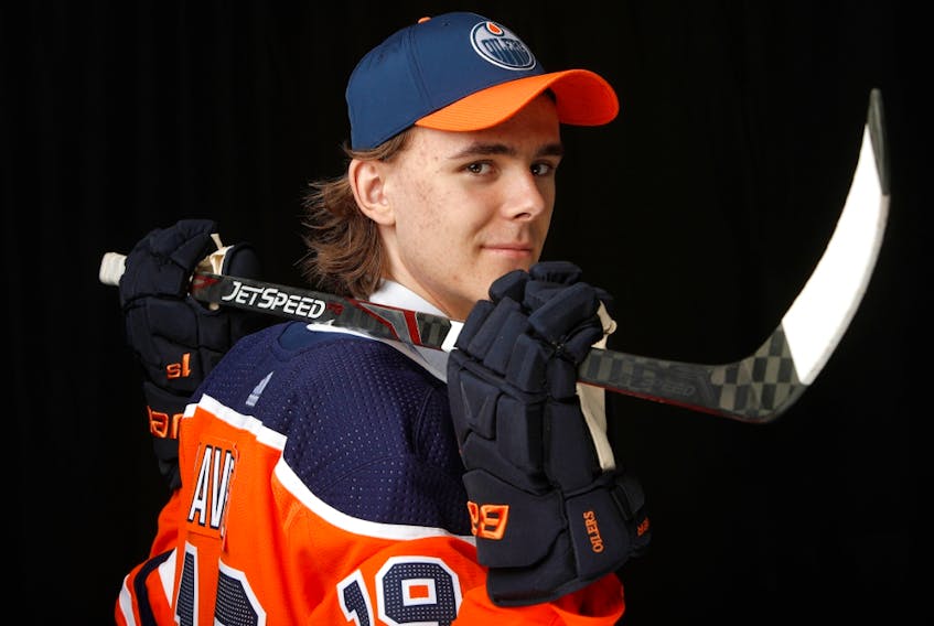 Raphael Lavoie poses after being selected 38th overall by the Edmonton Oilers during the 2019 NHL Draft at Rogers Arena on June 22, 2019, in Vancouver.