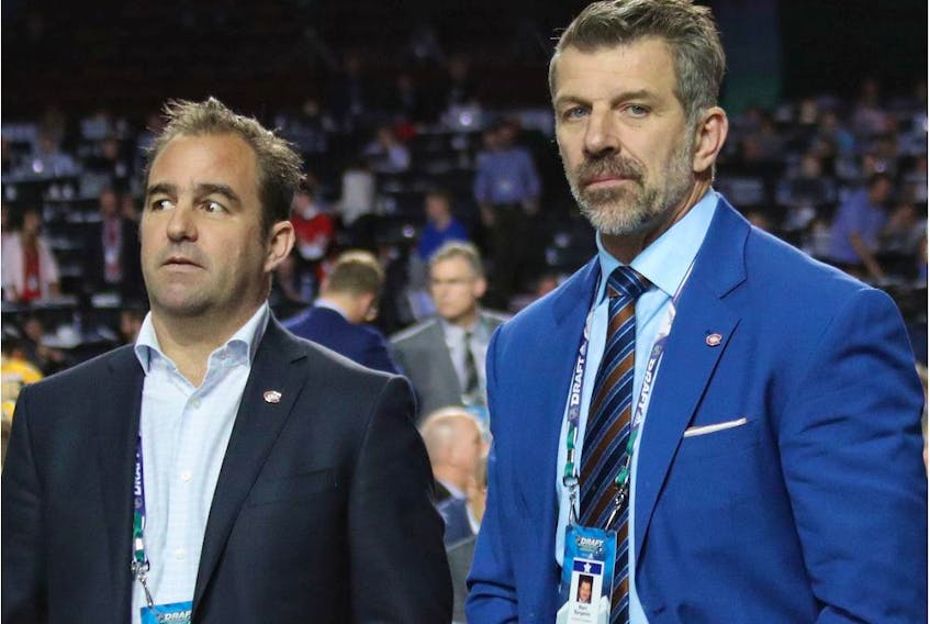 Canadiens owner/president Geoff Molson and Marc Bergevin on the floor of the Rogers Arena in Vancouver during the 2019 NHL Draft on June 22, 2019.