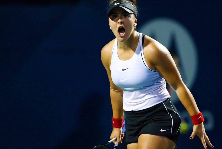 Bianca Andreescu celebrates a point against Eugenie Bouchard during in a first round match on Day 4 of the Rogers Cup at Aviva Centre on August 6, 2019 in Toronto.  (Vaughn Ridley/Getty Images)