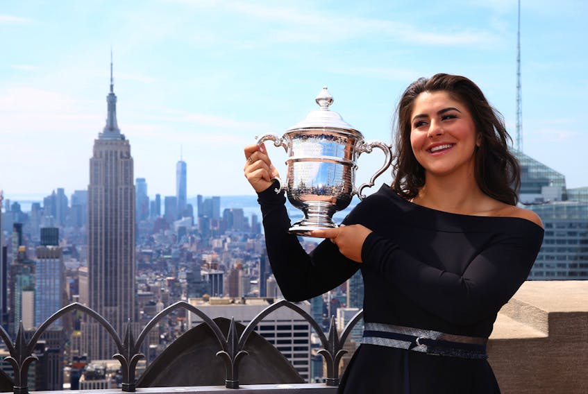  Bianca Andreescu poses with her trophy at the Top of the Rock in Rockefeller Center on Sept. 8, 2019 in New York City.