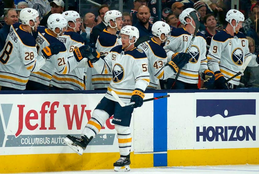 Sabres' Jeff Skinner is congratulated by teammates after scoring a goal Monday night against the Blue Jackets. Skinner, who signed a $72-million contract this past off-season, has 2-1-3 totals this season.  