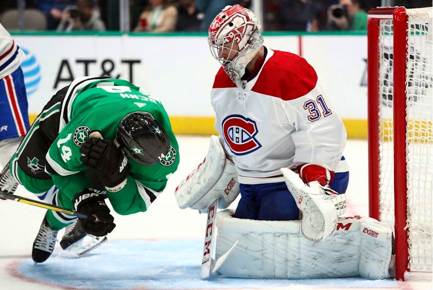 Canadiens' Carey Price defends against Stars' Jamie Benn in the third period at American Airlines Center on Saturday, Nov. 2, 2019, in Dallas.