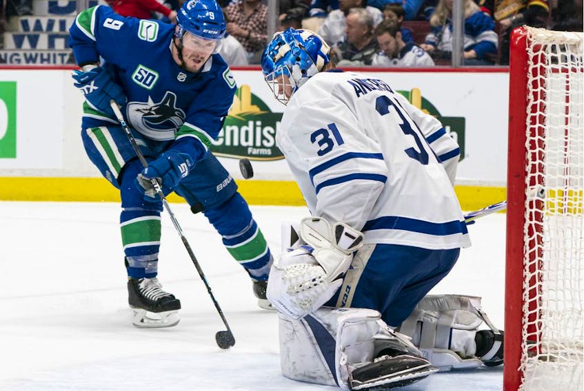  J.T. Miller of the Vancouver Canucks is stopped by goalie Frederik Andersen of the Toronto Maple Leafs.